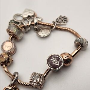 Pandora Gold and Silver Charm Bracelet with Intricate Designs
